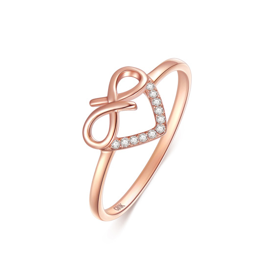 Anillo de oro rosa de 10 quilates con forma de corazón y diamantes