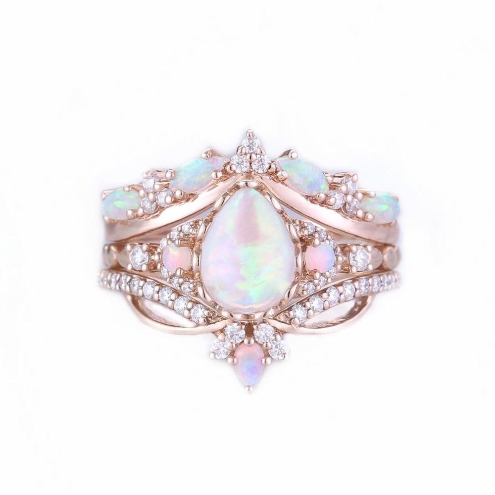 Anillo de oro rosa de 18 quilates con ópalo y moissanita-1