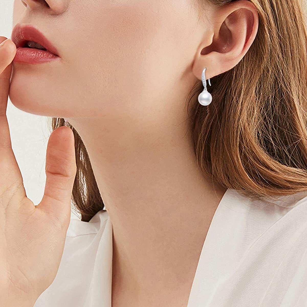 Aretes colgantes con perlas circulares de oro blanco de 14 quilates-2