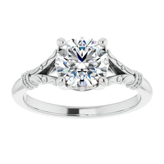 Anillo de compromiso solitario de moissanita de talla redonda en oro blanco de 10 quilates