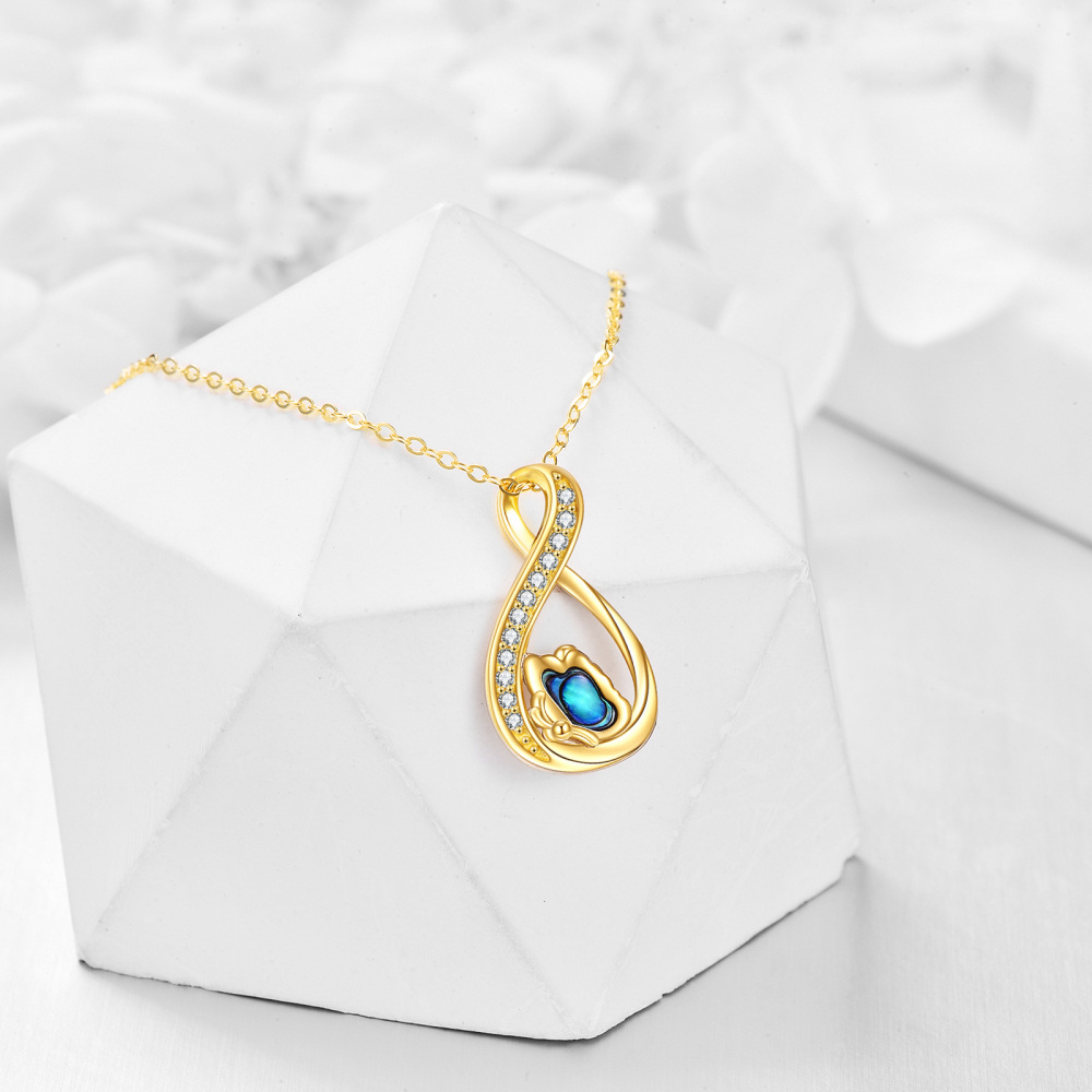 Collar con colgante de símbolo de infinito de mariposa de marisco de abulón de oro amarillo de 14 quilates para mujer-3