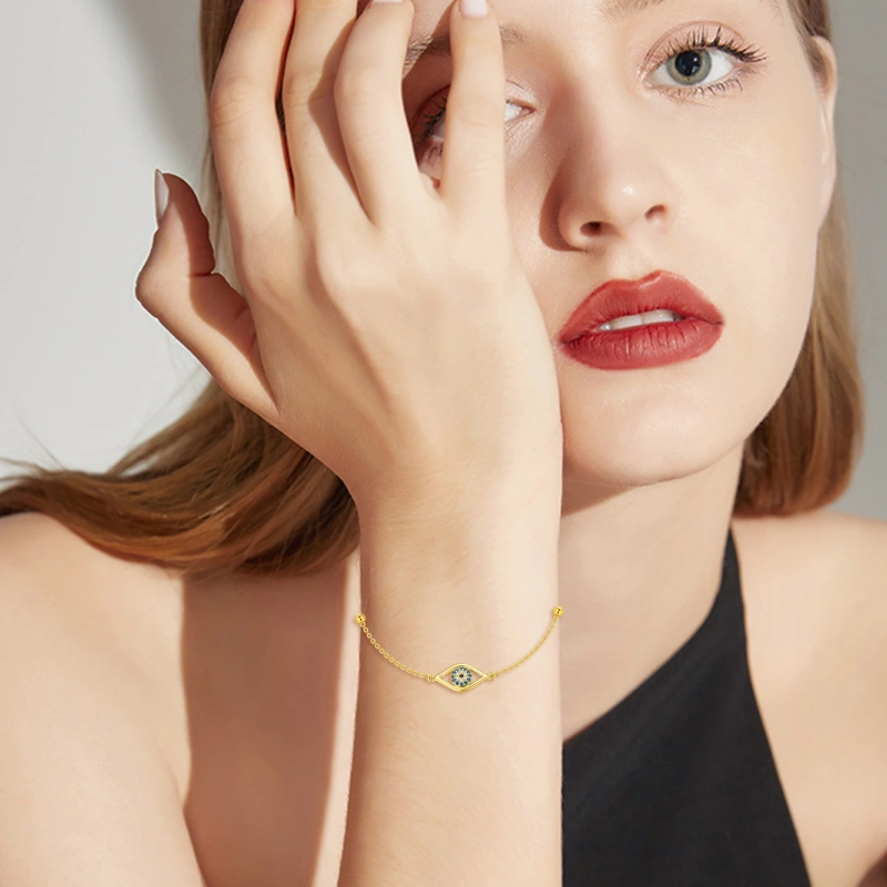 Pulseira em ouro branco de 10 quilates com contas de zircónia cúbica e pendente de olho grego.-2