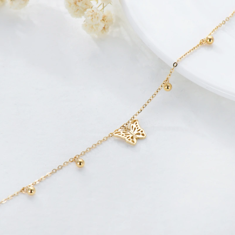 Tobillera de oro de 10 quilates con dije de mariposa y cuentas de una sola capa-4