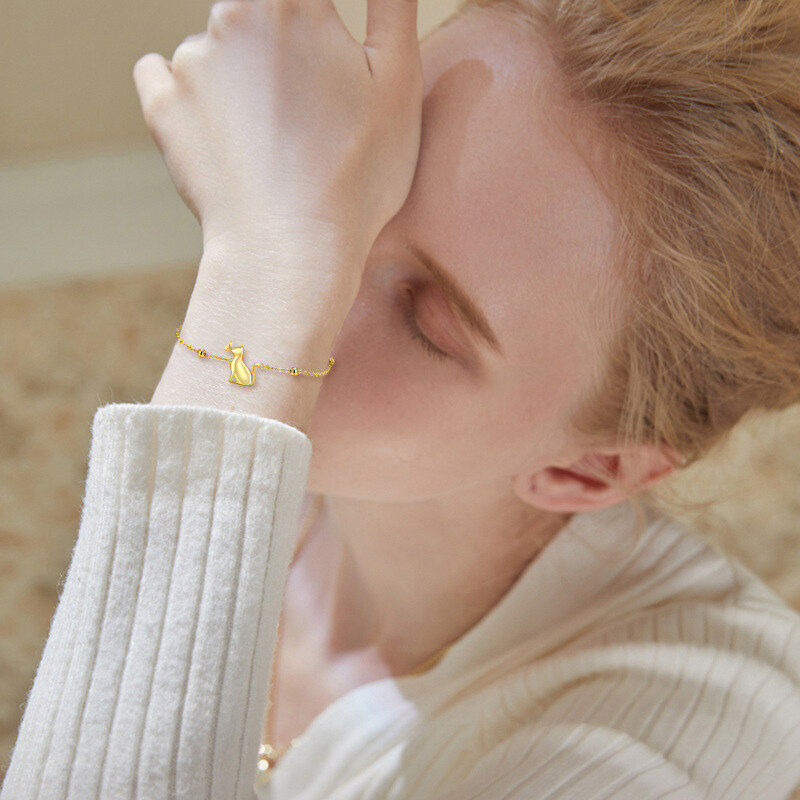 Pulsera con dije de mariposa y gato de oro de 18 quilates-2