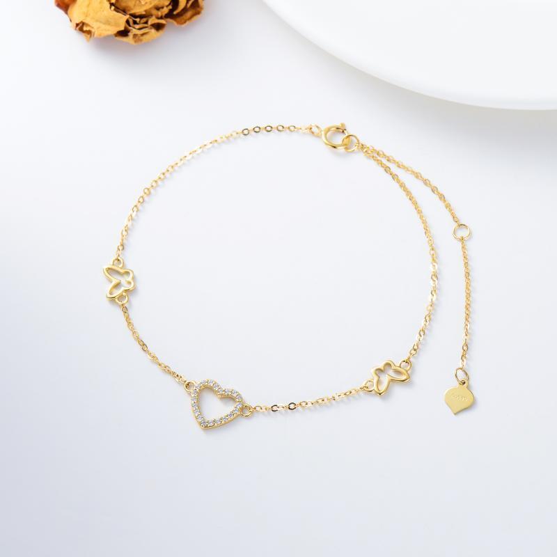 Pulsera con dije de mariposa y corazón de circonita cúbica en oro de 10 quilates-3