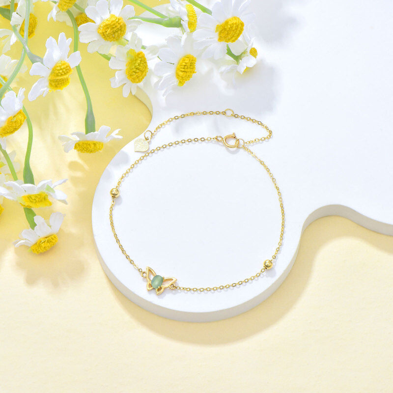 Armband aus 10-karätigem Gold mit Katzenaugenstein und Schmetterlingsanhänger-4