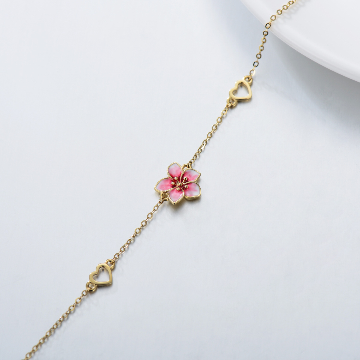 Pulsera con dije de corazón de flor de cerezo en oro de 14 quilates-4