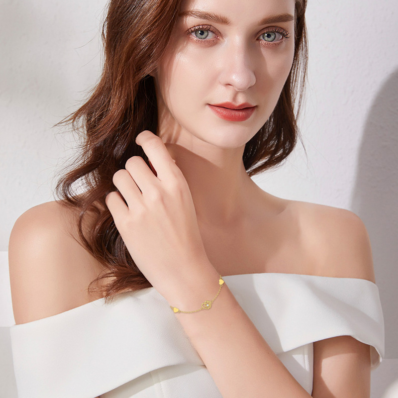 Armband met ronde zirkonia in 10 karaat witgoud met hartvormige bedel-2