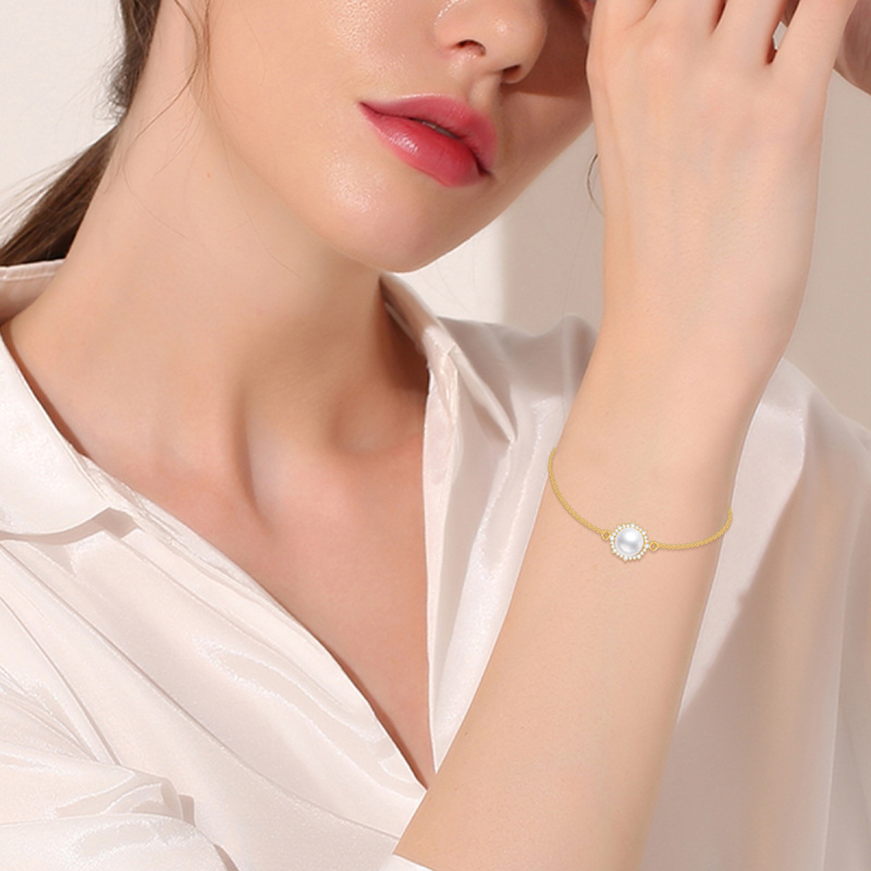 Pulsera con dije circular de oro de 18 quilates con moissanita y perla-2