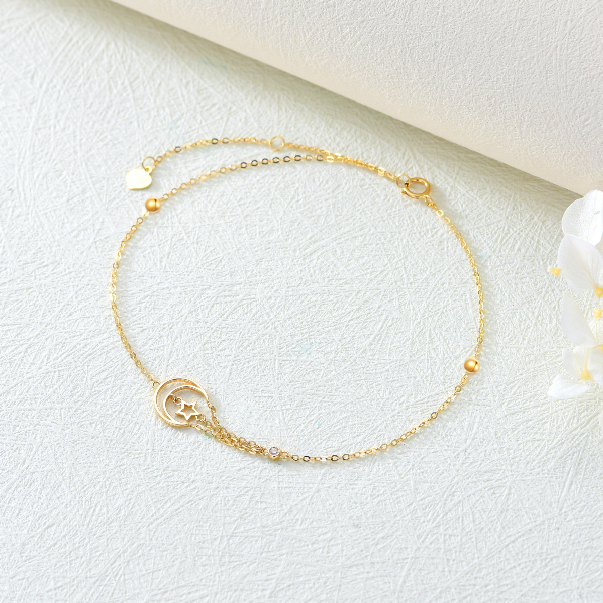 18K Gold Circular Shaped Cubic Zirconia Moon & Star Single 18K Gold Circular Shaped Cubic Zirconia Moon & Star Single