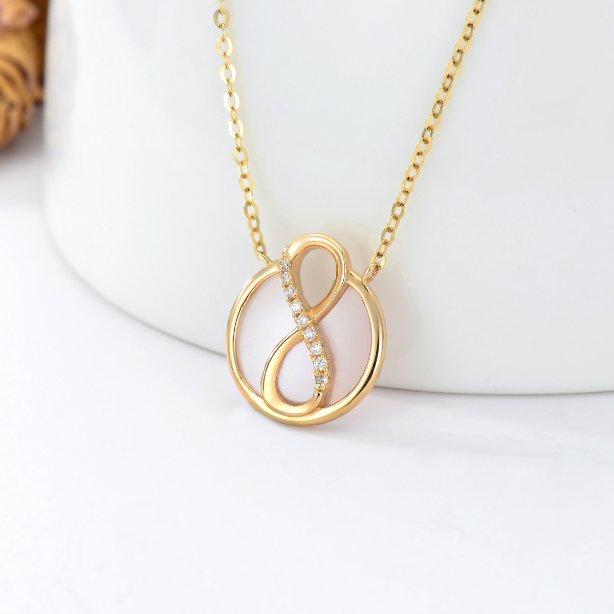 Collana con ciondolo a forma di circolare in oro 14K con simbolo infinito dell'opale-2