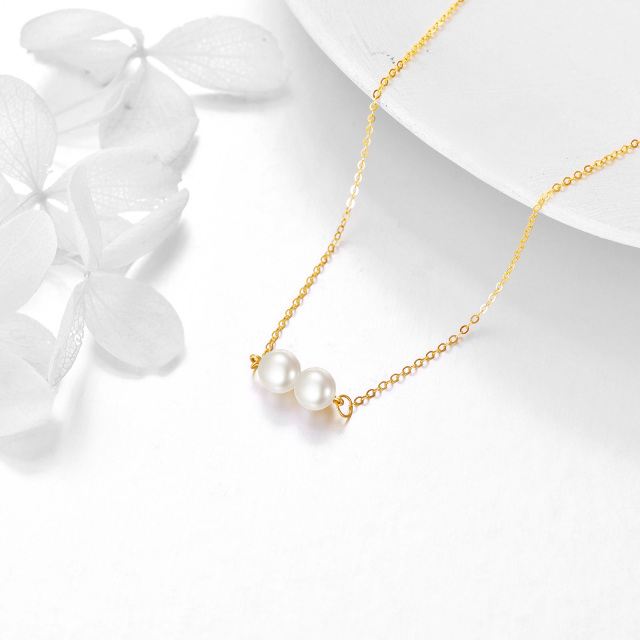 Collana con ciondolo di perle a forma circolare in oro 14K-4