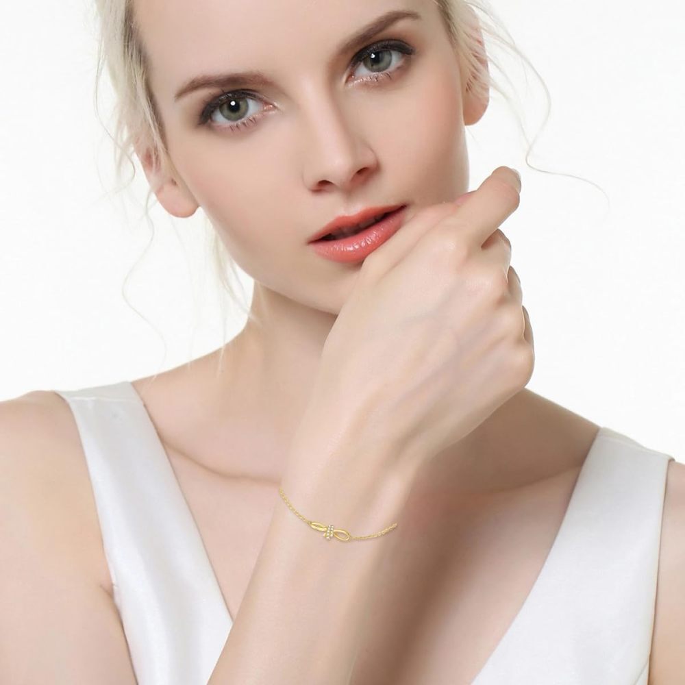 Pulseira com pingente de coração e laço de diamante em ouro 10K-2