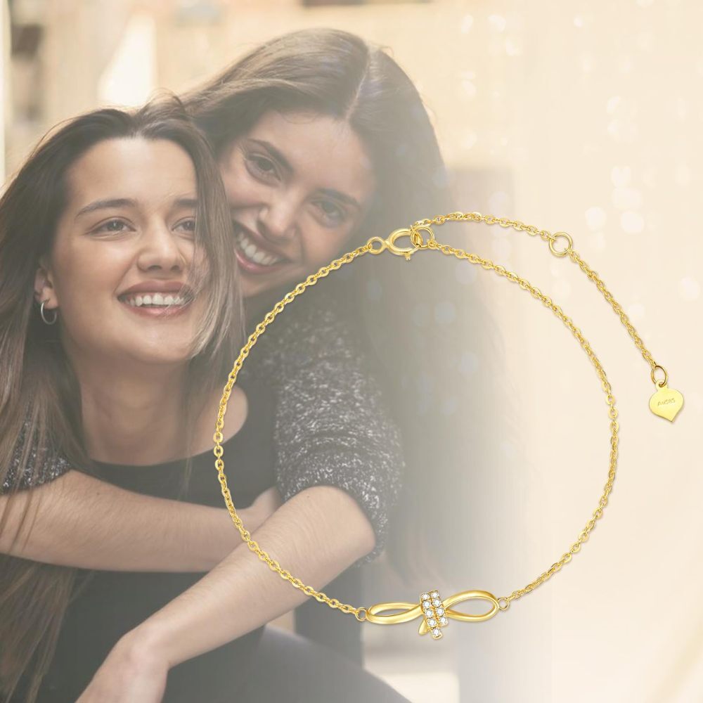 Pulseira com pingente de coração e laço de diamante em ouro 10K-3