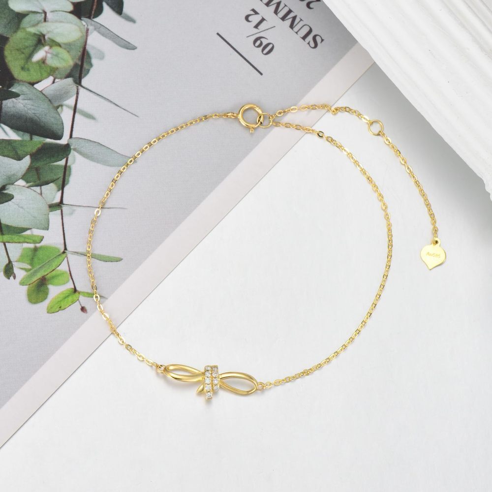Pulseira com pingente de coração e laço de diamante em ouro 10K-4