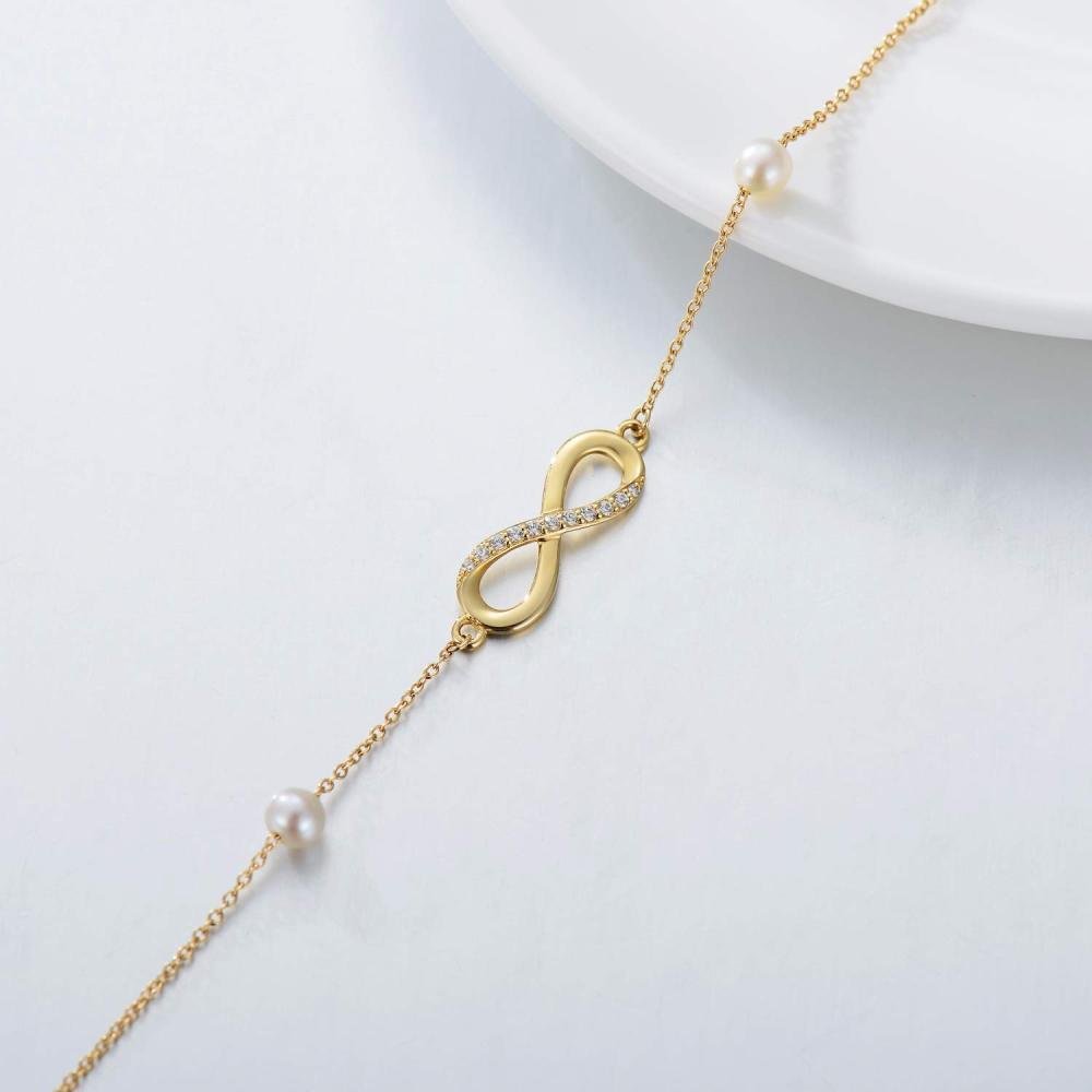 Tobillera con dije de una sola capa con símbolo del infinito y perla y diamantes en oro de 10 quilates-3