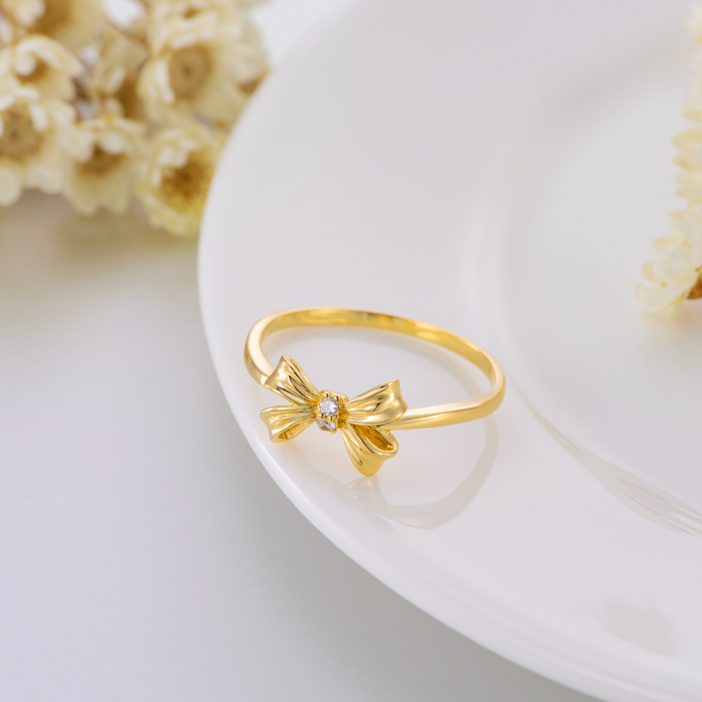 Anillo de lazo personalizado con grabado de diamantes en oro de 10 quilates y certificación IGI 3EX-5