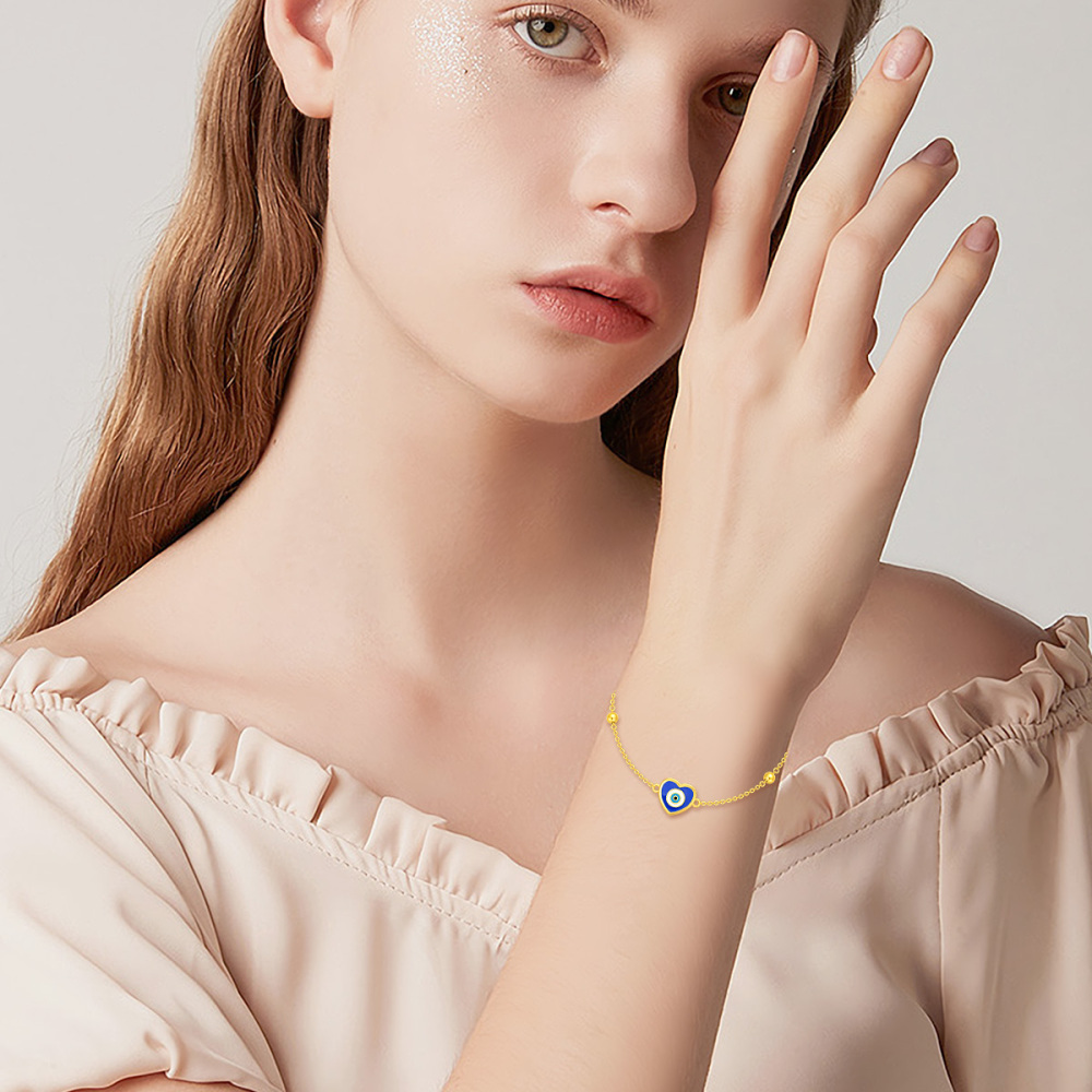 Bracelet à breloques mauvais œil en or 10 carats-2
