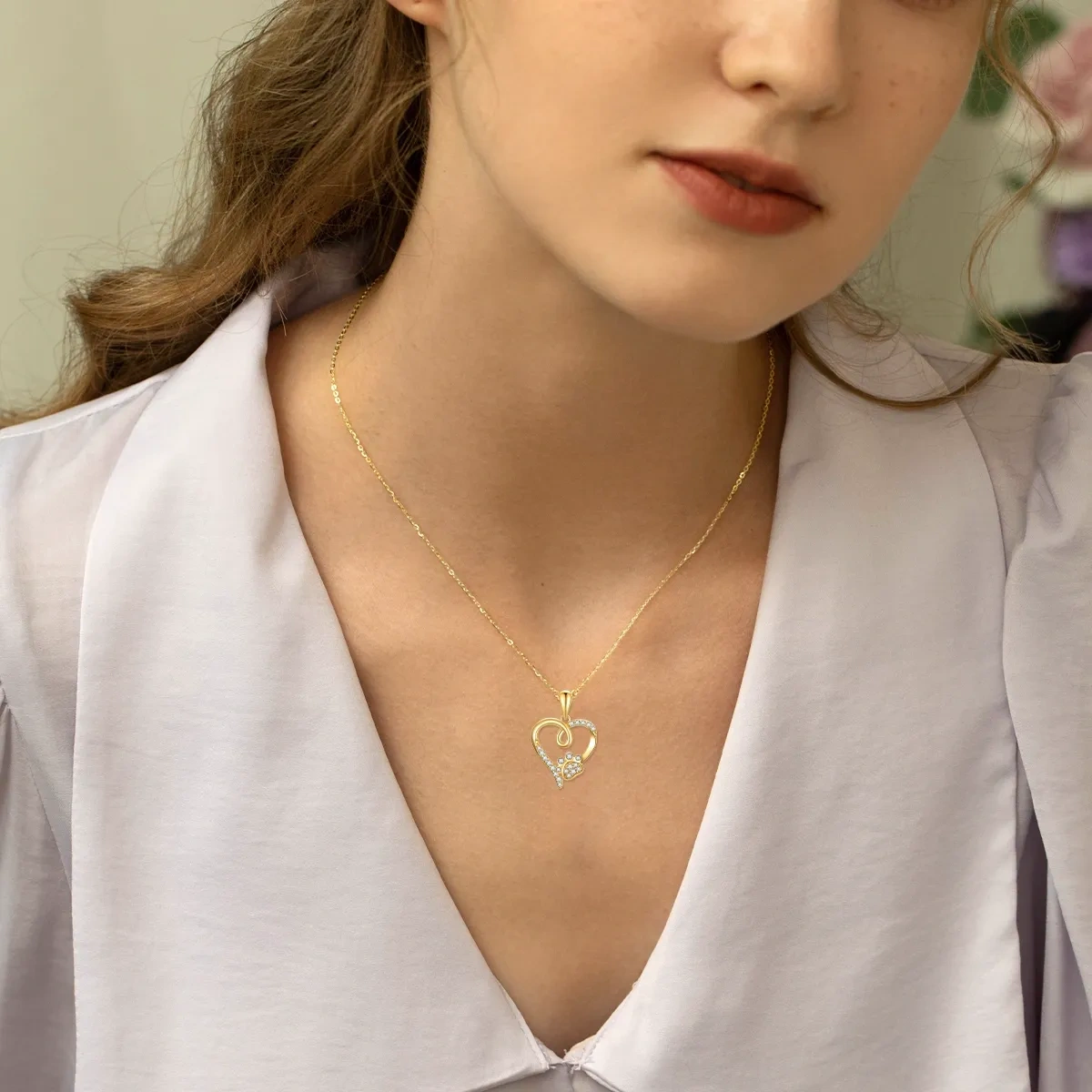 Collana con ciondolo a cuore e impronte di zirconi in oro 14K-2