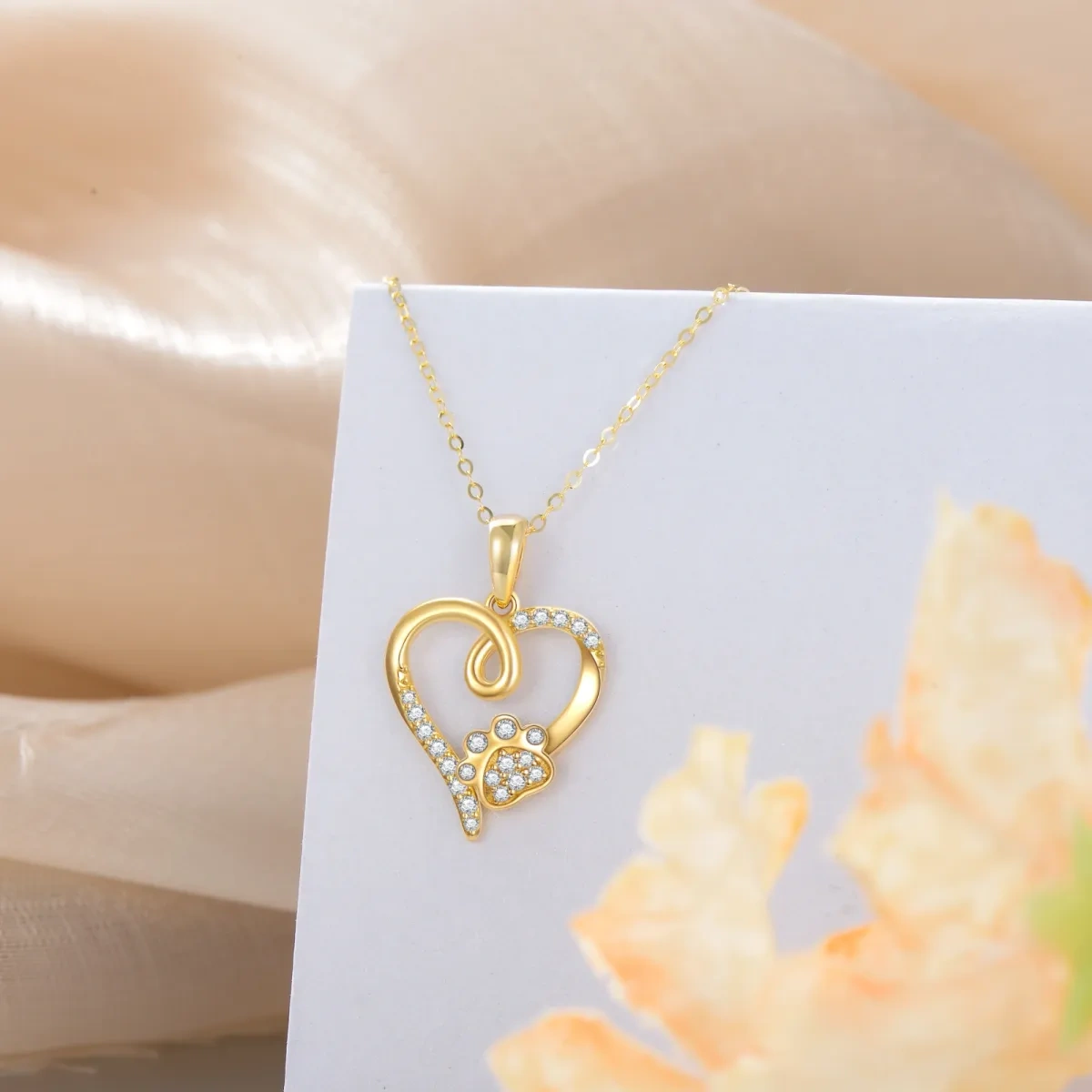 Collana con ciondolo a cuore e impronte di zirconi in oro 14K-4