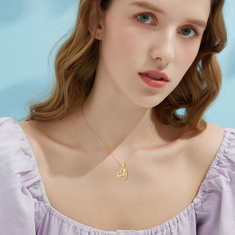 Collana con ciondolo a cuore e mano in oro 14K con zirconia cubica-2