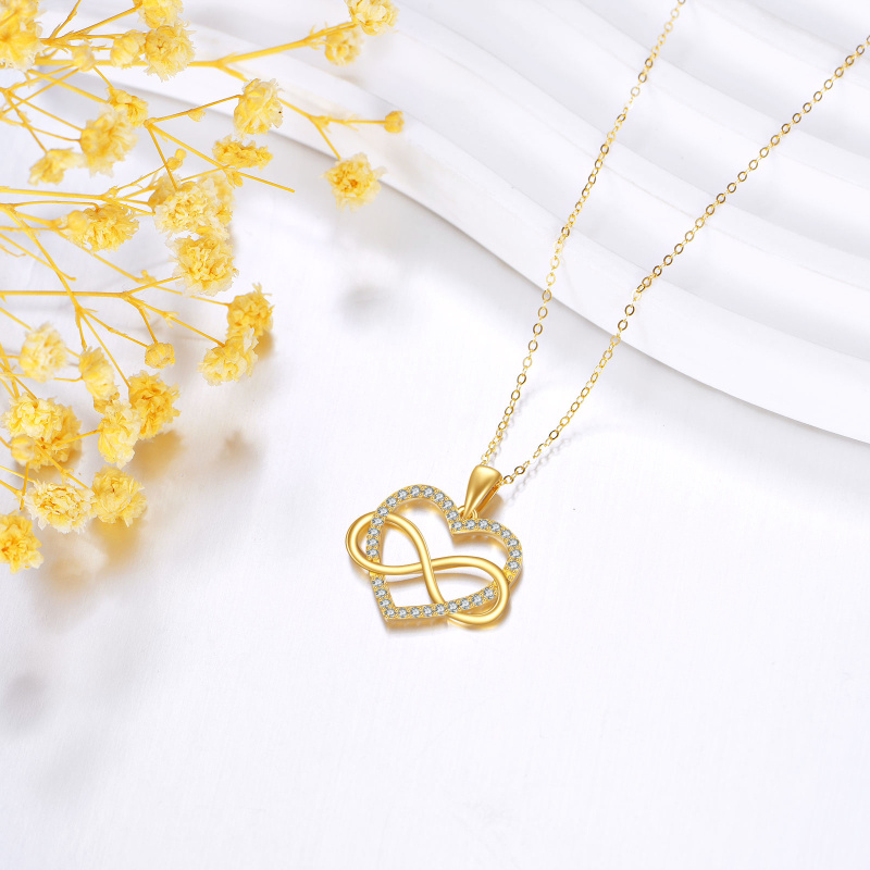 Collar con colgante de corazón y símbolo del infinito en zirconia cúbica de oro de 14 quilates-5