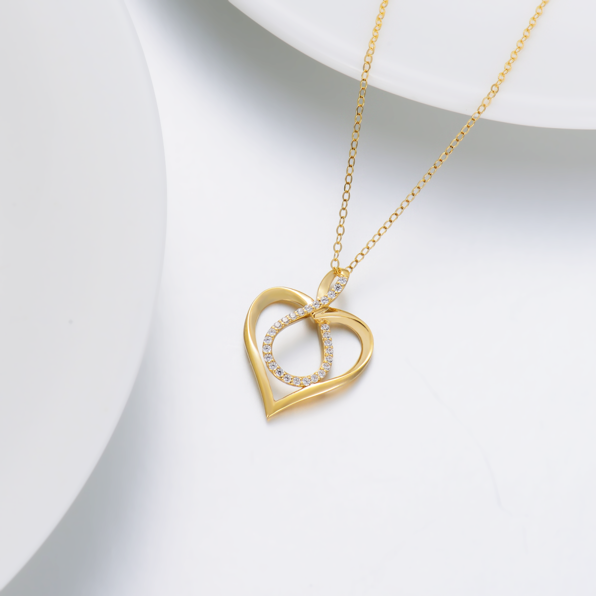 Collana con ciondolo a cuore e simbolo dell'infinito in oro 14K con zirconia cubica-5