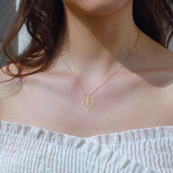 Collana con ciondolo a forma di zampa, cuore e simbolo dell'infino in oro 14K con zirconia cubica