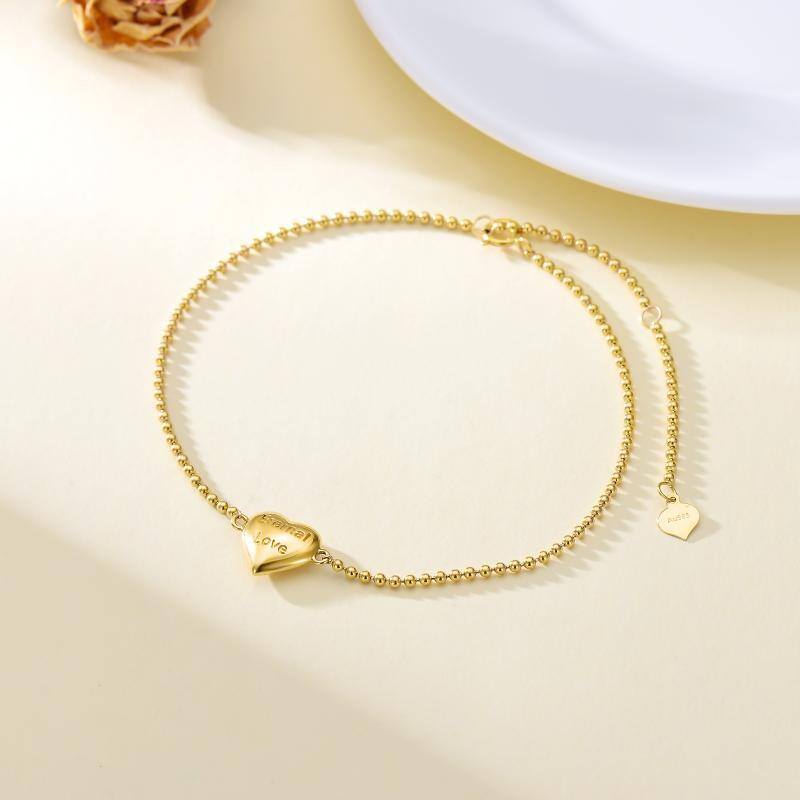 Bracciale con perline metalliche a cuore in oro 10K-3