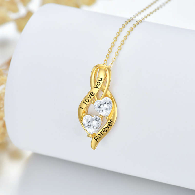 Colar com pendente em forma de coração e símbolo do infinito em ouro branco 10K com zircónias cúbicas.-3