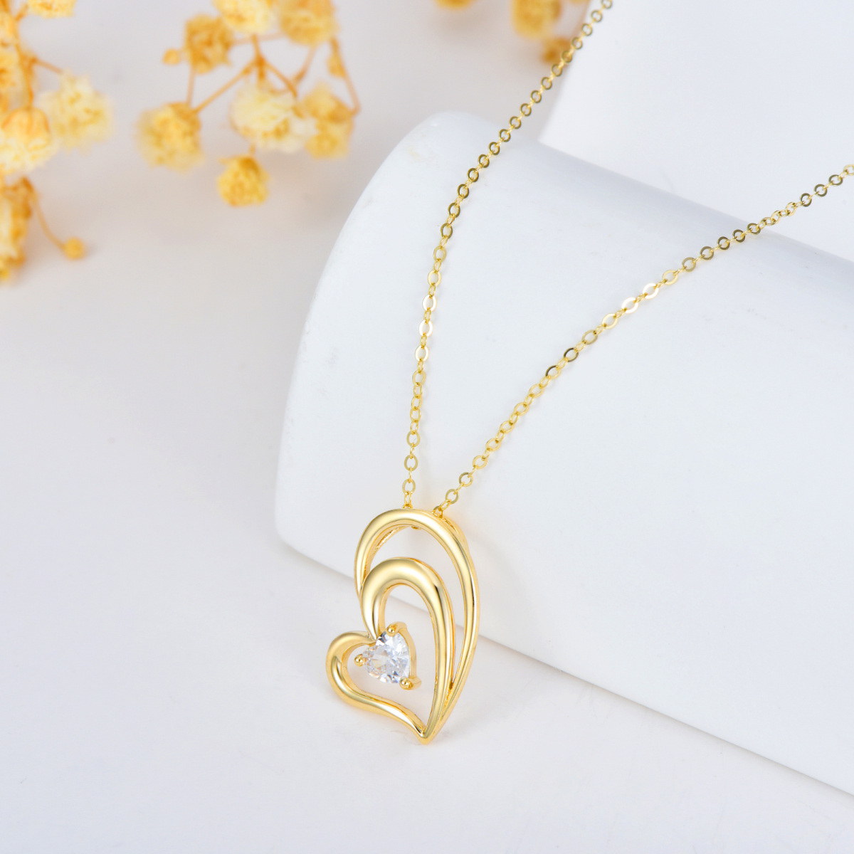 Collana con ciondolo a cuore con zirconi cubici a forma di cuore intrecciato in oro 14 carati-4