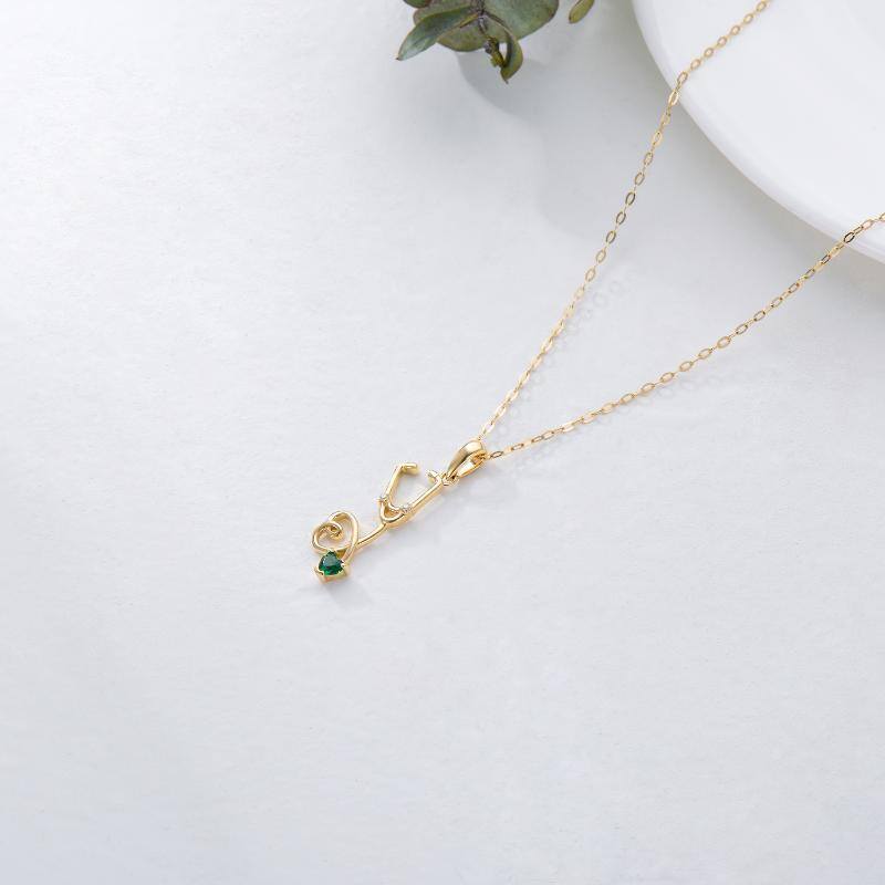 Colar com pendente de coração e estetoscópio em ouro 10K com zircónias cúbicas para mulher-4