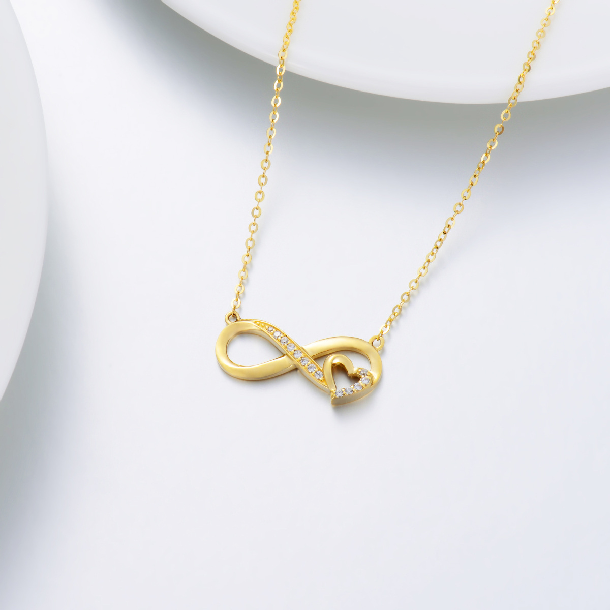 Collana con ciondolo a cuore e simbolo dell'infinito in oro 14K con zirconia cubica-4