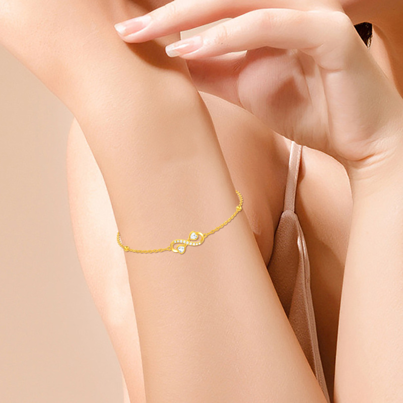 Pulsera con dije de símbolo de infinito en oro de 10 quilates y circonitas cúbicas-2