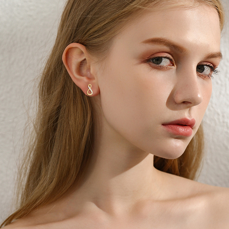 Brincos com símbolo do infinito em zircónio cúbico em ouro de 18K-2