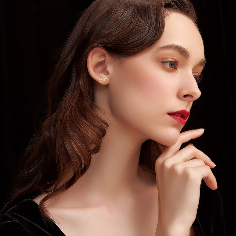 Orecchini a bottone con simbolo dell'infinito in oro 10 carati-2