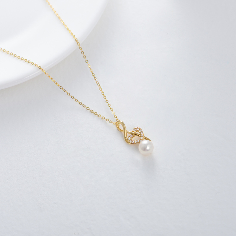 Collar con colgante de corazón y símbolo musical de moissanita y perla en oro blanco de 10 quilates-5