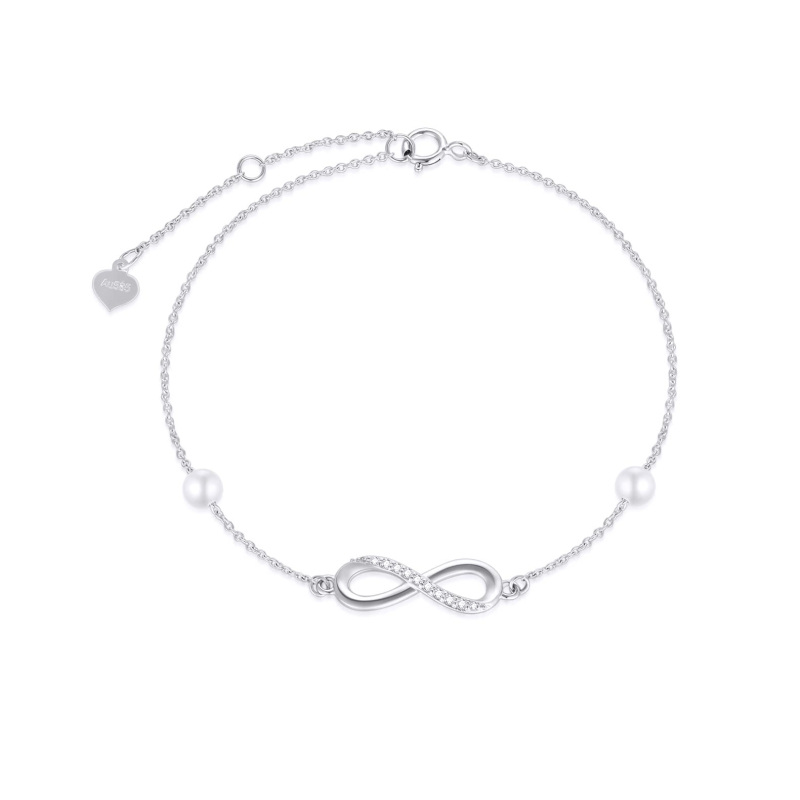 Bracelet de cheville monocouche en or 14 carats avec perles de moissanite et symbole infini