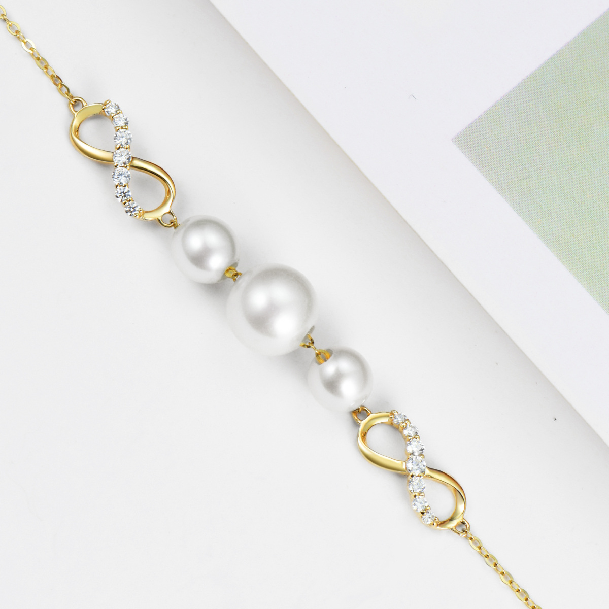 10K Gold Moissanite & Pearl Infinity Symbol Charm Bracelet-4