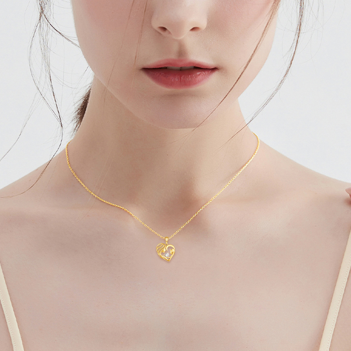 Collar con colgante de corazón para madre e hija con circonita cúbica en oro de 14 quilates-2