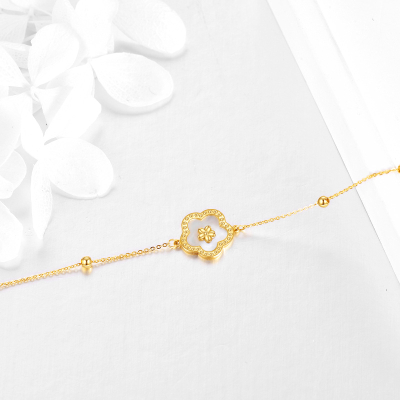 Armband met bedel van 10 karaat witgoud met parelmoer en madeliefjes-4