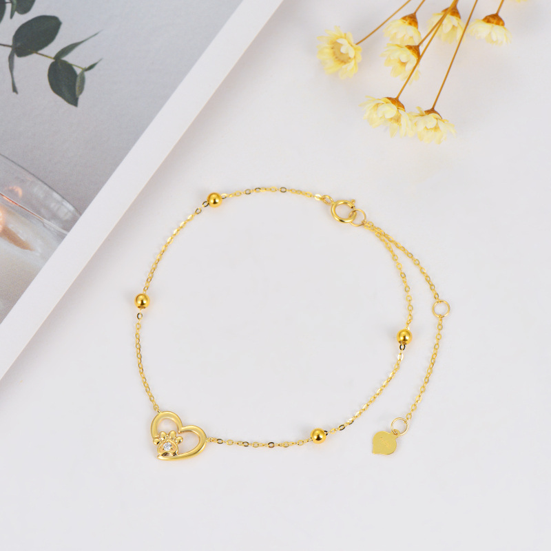 Armband met 10K gouden poot en ronde zirkonia harthanger-3