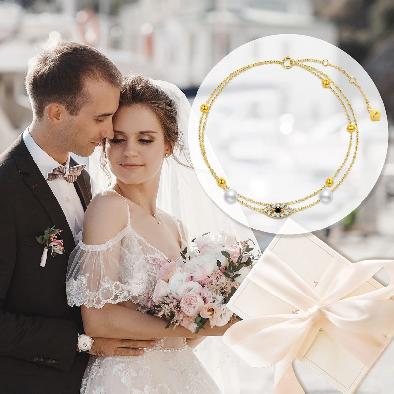 Tornozeleira multicamada em ouro 14K com pérola e olho de diabo-5