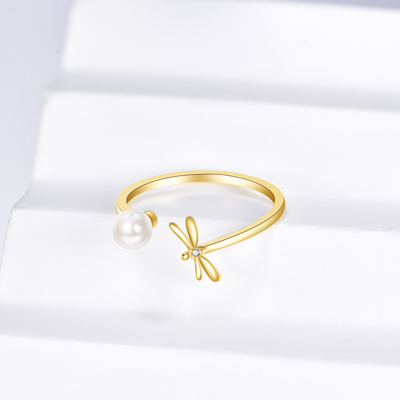 Anillo abierto de libélula con circonita cúbica y perla en oro de 10 quilates-3