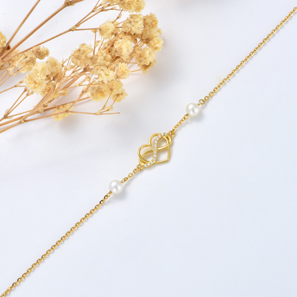 Pulseira com pingente de símbolo de infinito de coração de zircônia cúbica em ouro 10K para mulheres-4