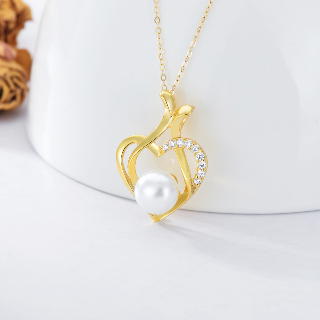 Collana con ciondolo a cuore e fiore di pesco in oro 14K con zirconi e perle-4