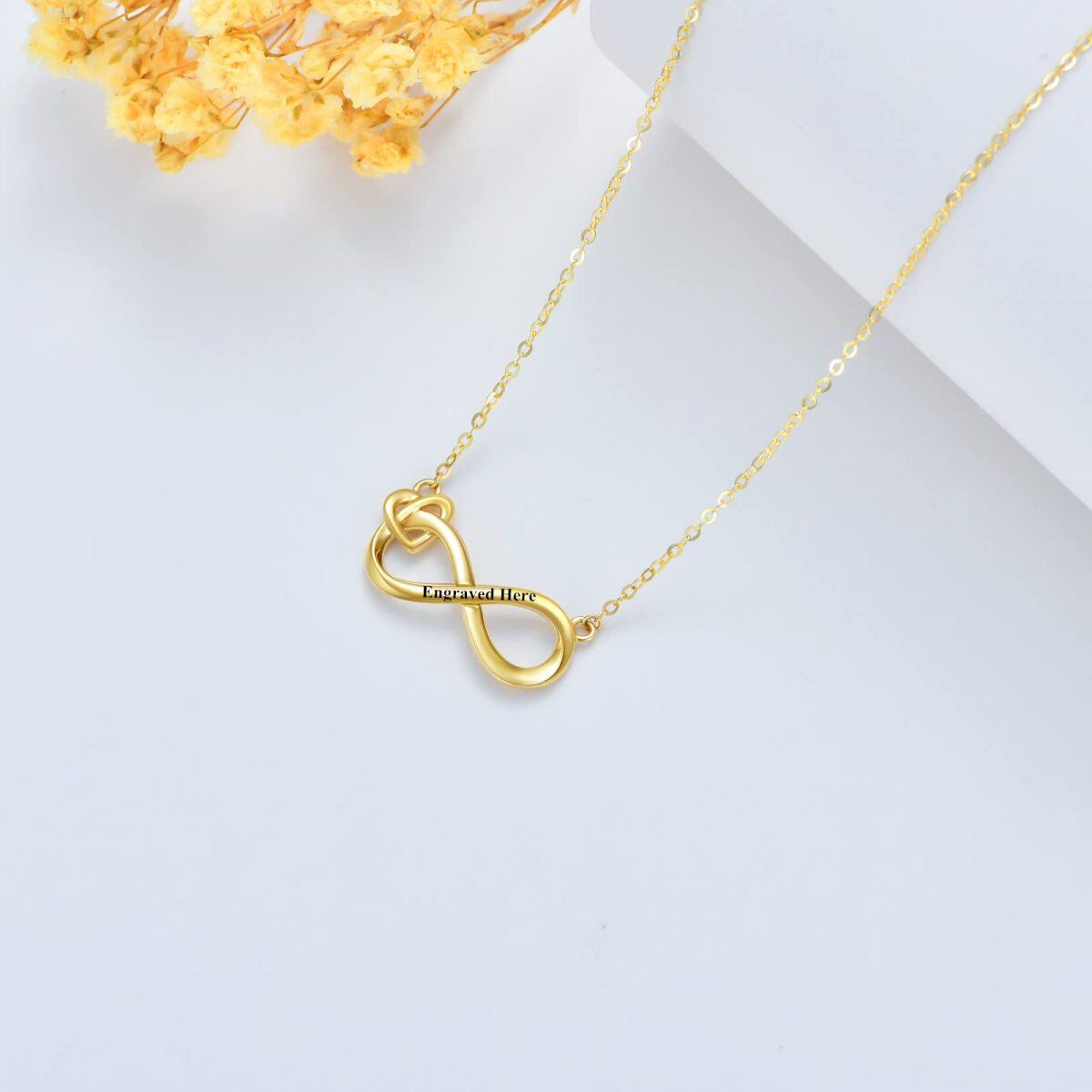 Colar com pingente de símbolo infinito em ouro 14K e gravação personalizada-3