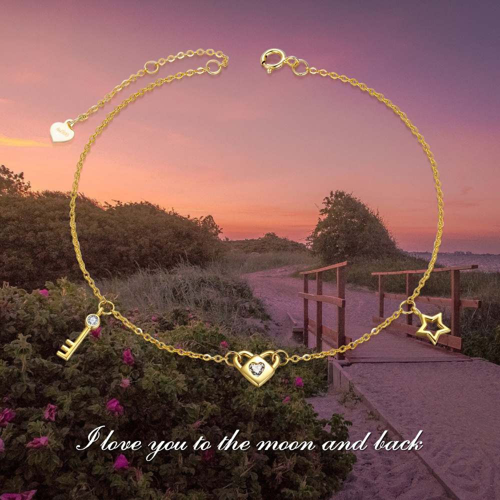 Armband mit rundem Moissanit-Herz und Schlüssel und Schloss aus 14 Karat Gelbgold für Damen-4