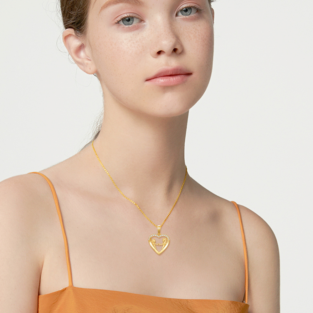 Collana con ciondolo a cuore e sorelle con zirconia cubica in oro 10K-2