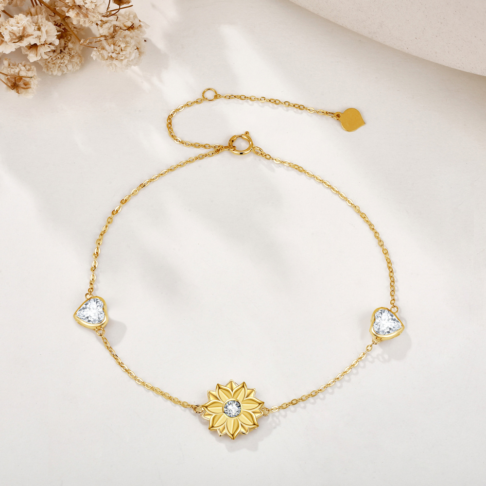 Pulsera con dije de corazón de girasol y circonita cúbica en oro de 14 quilates-3